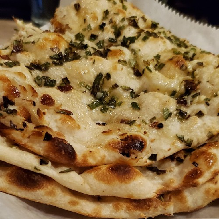 Savor our authentic naan